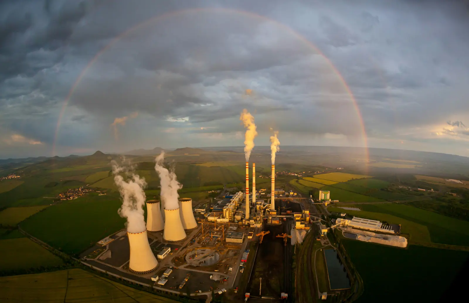 Aerial view of a power plant in open landscape