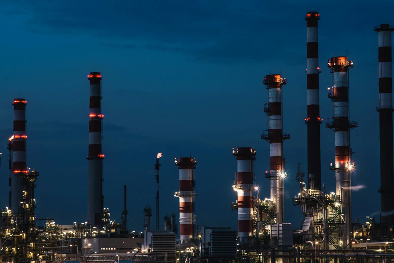 Oil, gas and LNG refinery at dusk